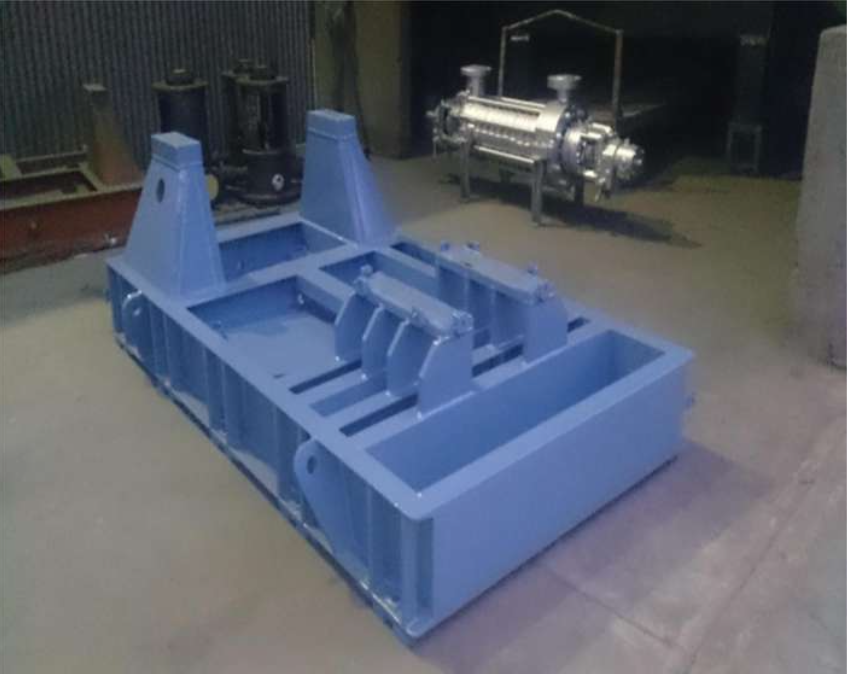 Base frame for heavy industrial machinery